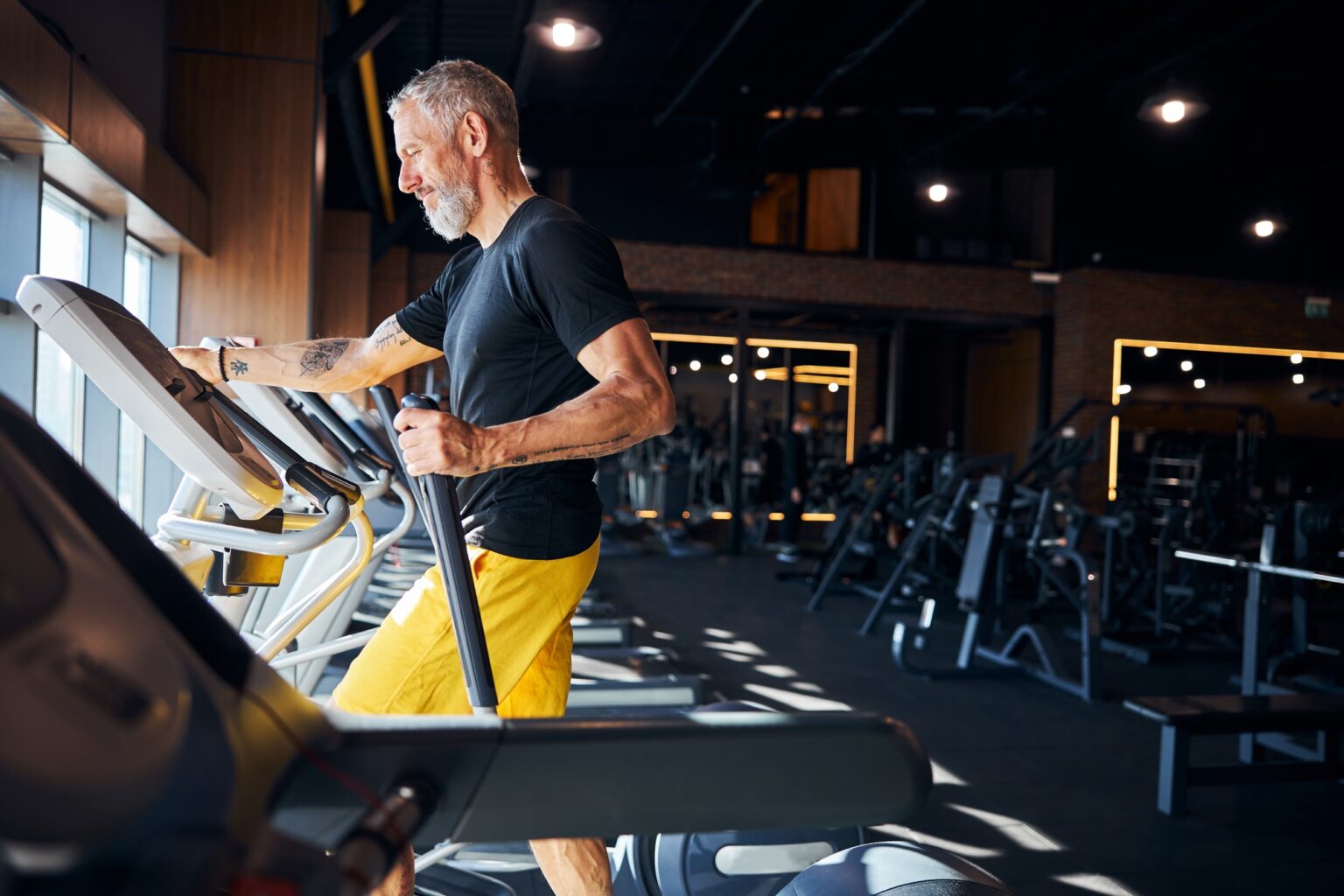 Serious athlete doing cardio training at the gym