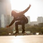 Skateboarding in sunset city