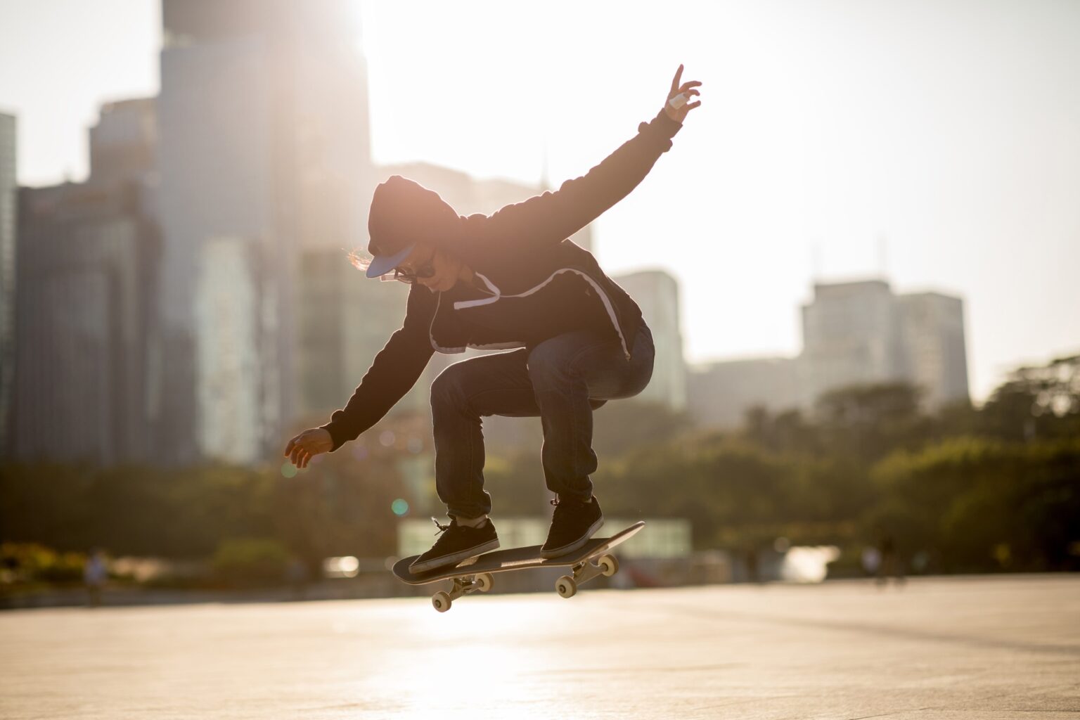 Skateboarding in sunset city